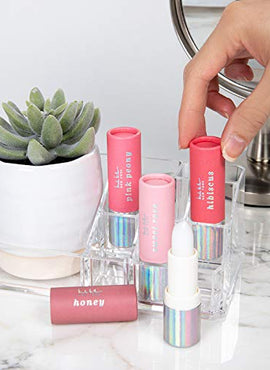 Nicole Miller 4 Pack Lip Balm Set- Moisturizing Lip Balm in Honey, Hibiscus, Sweet Rose, and Pink Peony